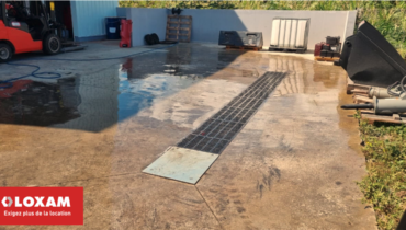 Une aire spécialisée pour le lavage des engins chez LOXAM Rental Réunion.
